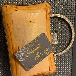 Elegant Gold Clutch with Rhinestone Handle